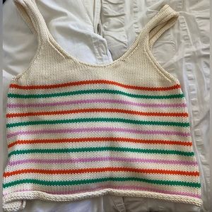 Cream and striped knit crop tank top.
